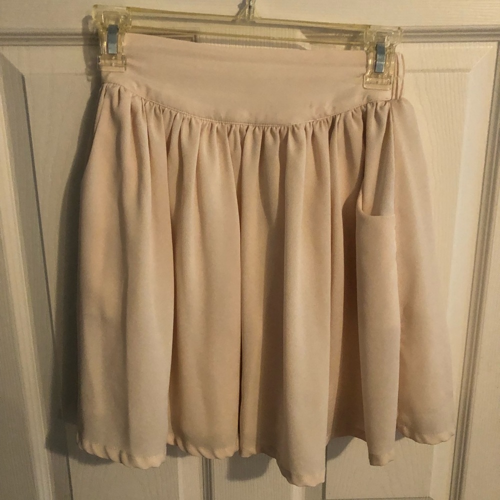 Off white, creamy colored skirt